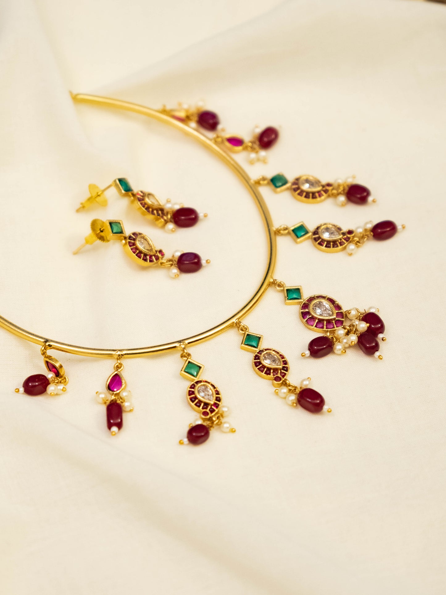 Ruby Kundan Hasli Set