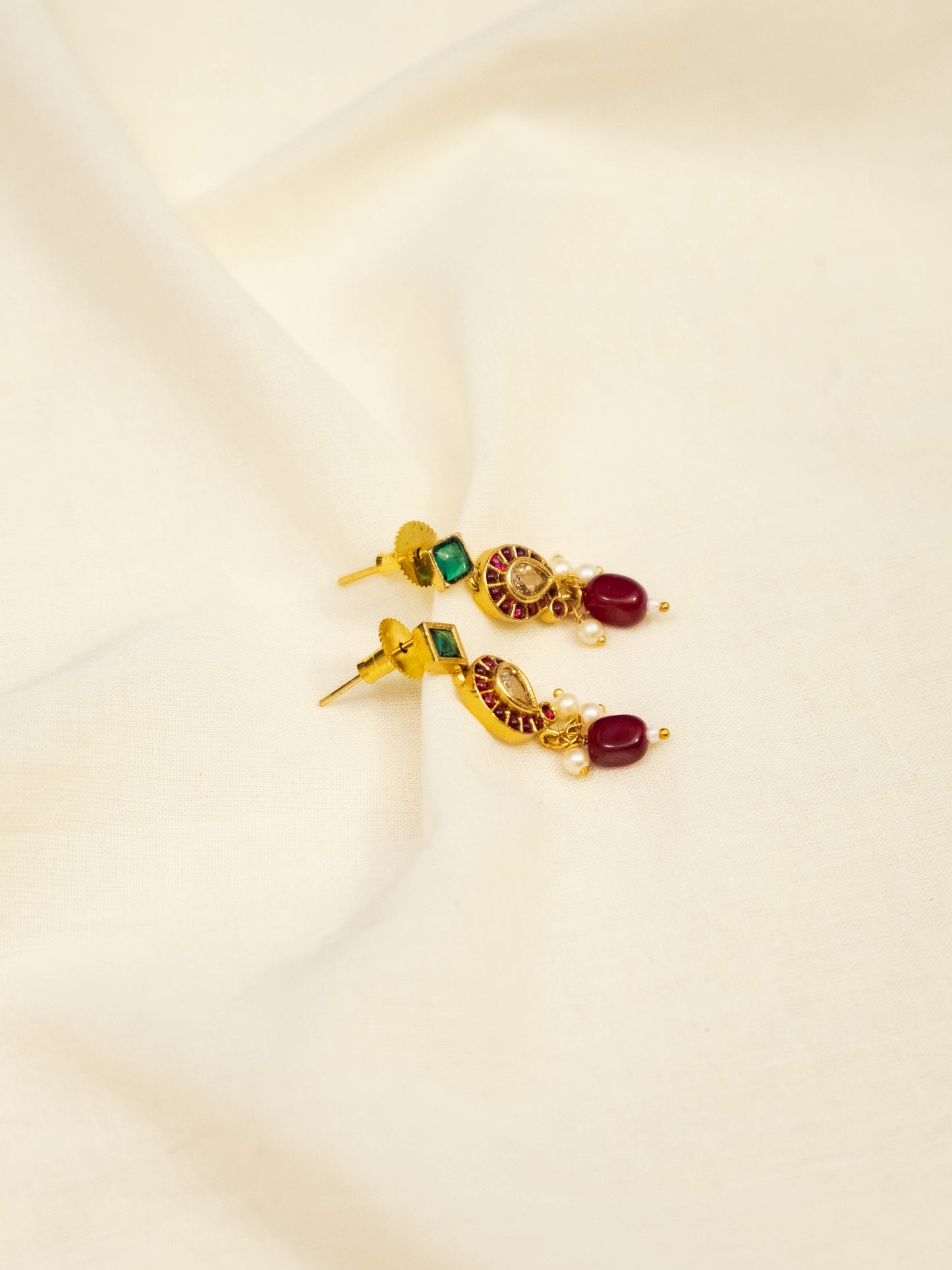 Ruby Kundan Hasli Set
